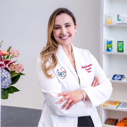 Radwa Ghanima, President and Board Director of Alberta Independent Pharmacy Association, in a clinical pharmacy setting.